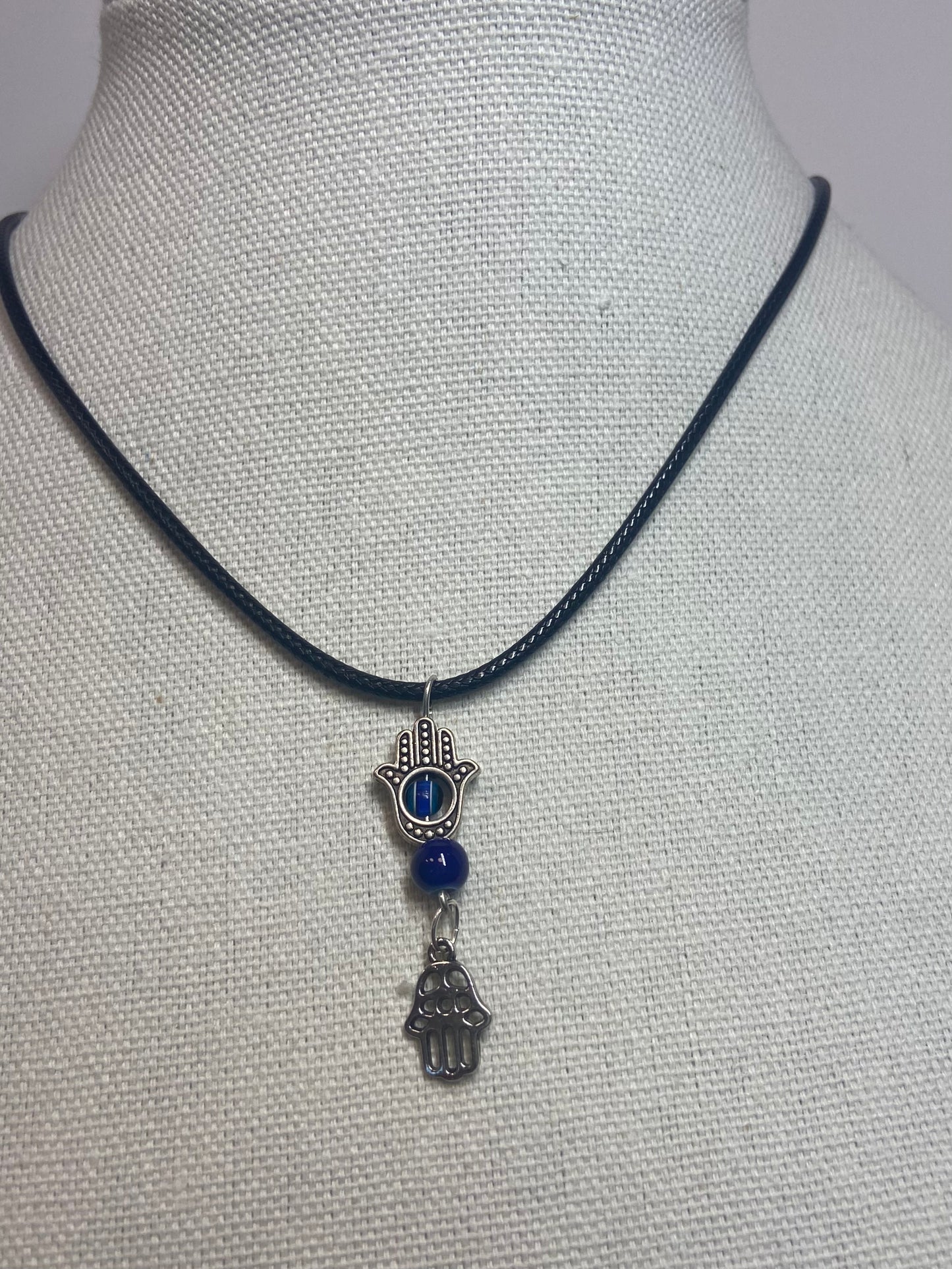 Necklace evil eye with hand